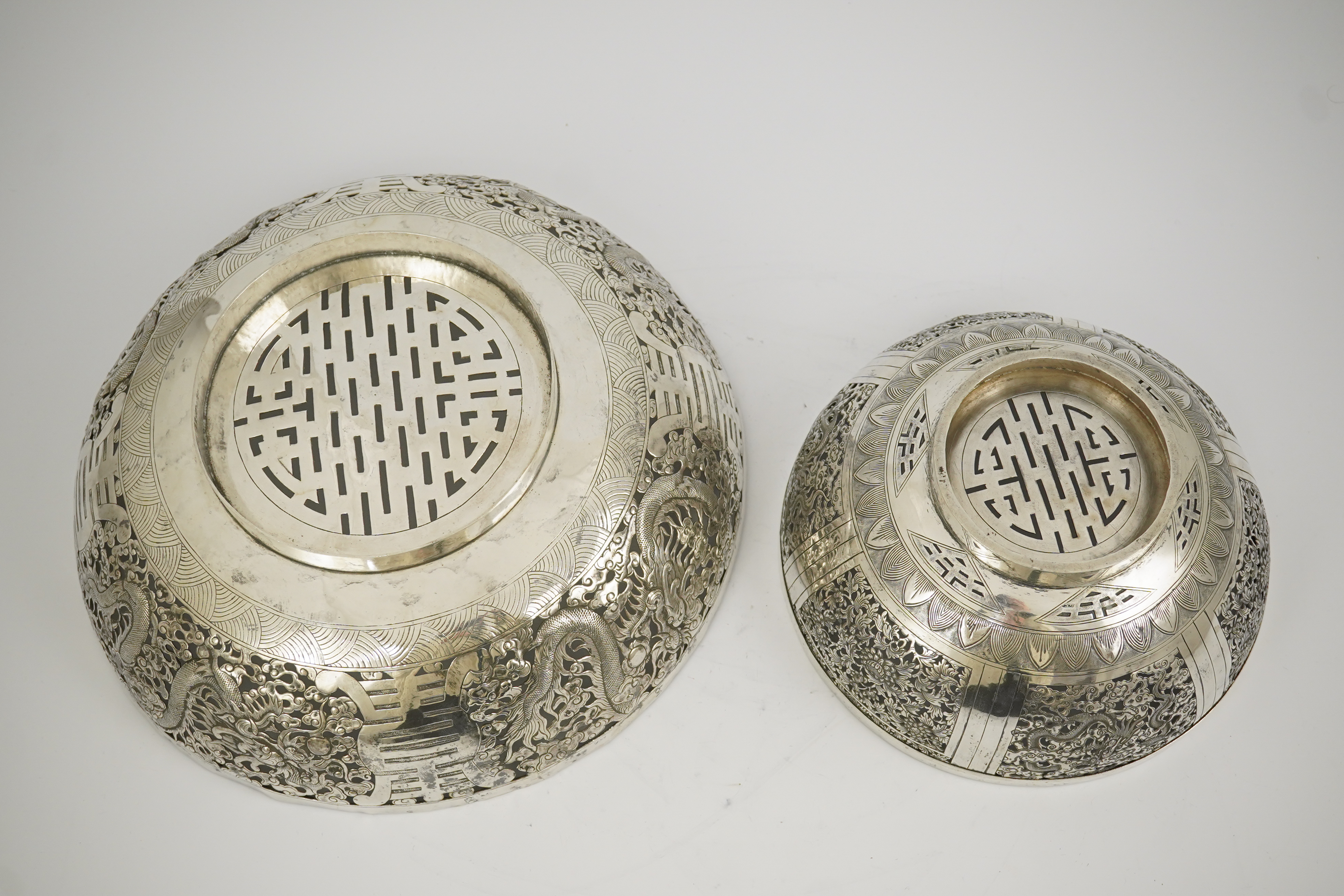 Two early 20th century Chinese Export pierced silver circular bowls